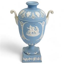 Group of five late 19th and early 20th century Wedgwood blue jasperware urn vases, H28cm and smaller (5)