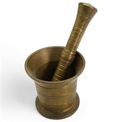 19th century Eastern bronze pestale and mortar, together with an earlier bronze mortar, H11cm (3)