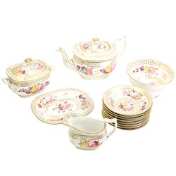 Early 19th century English porcelain tea service, hand painted with floral sprays within trailing gilt borders, comprising teapot and stand, slop bowl, sucrier, milk jug and eight saucers 