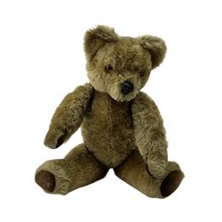 Vintage plush teddy bear with applied eyes, moulded nose, stitched mouth, and jointed limbs with growler mechanism L45cm 