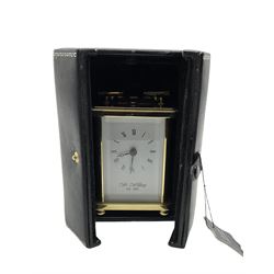 William Widdop - 20th century 8-day  brass cased carriage clock with an enamel dial, Roman numerals, minute track and steel moon hands, single train timepiece movement with a lever platform escapement, housed in a bespoke leather case, with key. 