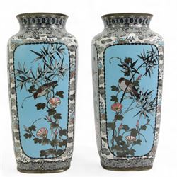 Pair of Japanese Cloisonne vases, of rounded square form, each decorated with four panels depicting birds amongst trees, against turquoise and pale blue/ grey ground, unmarked, H32cm