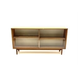 Teak sideboard, glazed sliding doors enclosing two adjustable shelves 