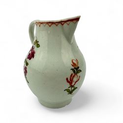 18th century Lowestoft porcelain sparrow beak jug, hand painted in polychrome enamels with a starflower and floral sprays, within line and loop brick-red border, H8cm