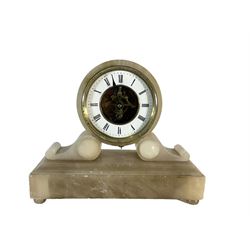 French - late 19th century 8-day mantle clock in an alabaster case,  with a drum movement raised on scroll supports and stepped plinth, open dial displaying the skeleton movement, escapement and motion work, enamel chapter with Roman numerals and spade hands enclosed within a glazed brass bezel, single train tick tac escapement with integral pendulum, wound and set from the front.