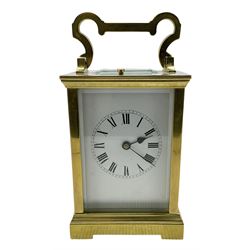 French - early 20th century carriage clock in a Anglaise case with four bevelled glass panels, with a twin train rack striking movement and repeat work, striking and repeating the hours and half hours on a coiled gong, enamel dial with Roman numerals, minute markers and steel spade hands, 8-day duration with a jewelled lever platform escapement and key.