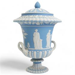 Group of five late 19th and early 20th century Wedgwood blue jasperware urn vases, H28cm and smaller (5)