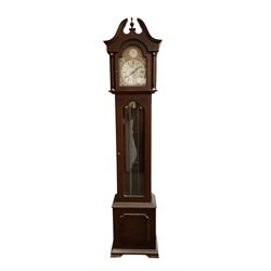 20th century - 8-day Mahogany longcase clock, with a swans necked pediment and break arch hood door beneath,  glazed door with visible brass cased weights and pendulum, on a rectangular plinth with a raised panel and bracket feet, brass dial with a silvered dial centre and chapter ring, chain driven three train movement chiming the quarters and hours on gong rods. With weights and pendulum.  