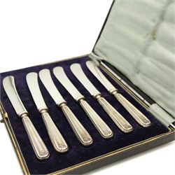 Set of eight silver handled dessert knives Sheffield 1977 Maker William Yates Ltd, pair of silver serving spoons Sheffield 1906 Maker Lee & Wigfull, early 19th century silver caddy spoon and set of six silver handled pastry knives 