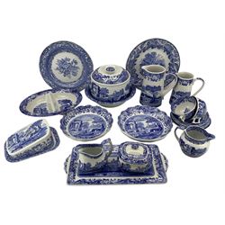 Spode Italian tableware comprising two tea cups & three saucers, rectangular sandwich tray, tea plate, sucrier, two milk jugs, bowl, three shaped bowls, tureen, two jugs, butter dish and twin section serving dish, black back stamps, together with two Spode Blue Room Collection plates 