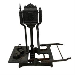 Victorian cast and wrought iron set of sack scales, shield and scrolled decoration, with three associated weights