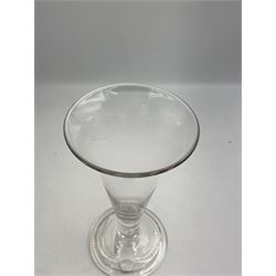 Large 18th century ale glass, circa 1780, with drawn trumpet bowl and flared rim, teardrop stem on a domed folded foot, H20cm