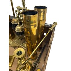 Two Trench Art shell cases, two part brass companion sets and other fire irons, 19th century and later brass candlesticks including a pair of George III oval candlesticks and other brassware in one box