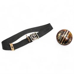 19th century tortoiseshell and pique work circular brooch and a black silk mourning band, with 9ct gold white enamel and diamond initial 'E' slide 