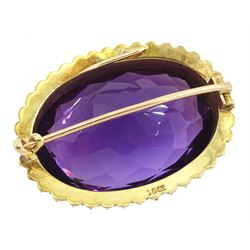 Early 20th century gold large oval cut amethyst and seed pearl brooch, stamped 15ct