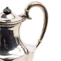 Silver oval teapot with ebonised lift, ivory insulators, loop handle and raised on four shaped supports and matching hot water jug Sheffield 1922/3 Maker Fenton Bros. Ltd. This item has been registered for sale under Section 10 of the APHA Ivory Act