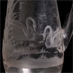 19th/ early 20th century crystal water jug, probably Stourbridge, of baluster form engraved with two Swans on a lake, amongst ferns, reeds and a palm tree, on circular pedestal star engraved foot, H28cm, heavy cut glass jar and cover on pedestal foot, together with a Lalique Samoa frosted glass scent bottle, signed Lalique, France, and labelled 11312 H8cm (3)