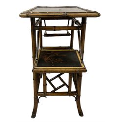 Late 19th century Aesthetic Movement lacquered and painted bamboo occasional table, rectangular top painted with Japanned traditional bird and blossom scenes, over two fold-out side leaves and undertier with pierced gallery apron