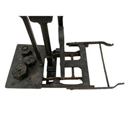 Victorian cast and wrought iron set of sack scales, shield and scrolled decoration, with three associated weights