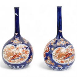 Pair of Japanese Imari bottle vases, H22cm