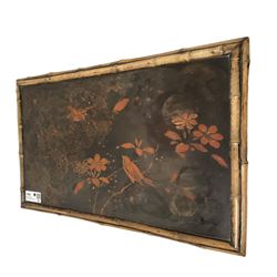 Late 19th century Aesthetic Movement lacquered and painted bamboo occasional table, rectangular top painted with Japanned traditional bird and blossom scenes, over two fold-out side leaves and undertier with pierced gallery apron