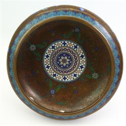 Chinese cloisonne bowl with inverted rim, decorated with geometric and floral design against a burnt orange ground, D21cm, a similar blue ground bowl, pepper pot and open salt, Japanese Inaba style cloisonne plate, decorated with an exotic bird amongst prunus, against a black ground, D15cm and another cloisonne dish (6)