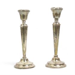 Pair of silver candlesticks with tapering stems on circular bases H25cm Birmingham 1949  Maker William Adams Ltd, 