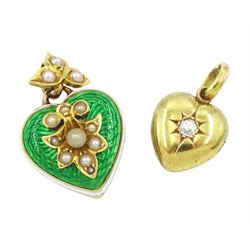 Victorian gold single stone old cut diamond, hinged locket heart pendant, stamped 15 and one other Victorian 15ct gold green enamel heart pendant, with white enamel border, applied gold pearl decoration and split pearl leaf bail, the reverse with glazed locket and engraved 21st June 1899