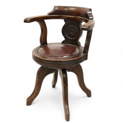 Early 20th century walnut 'P&O' swivel desk chair, curved back over shaped splat carved with monogram 'P&O', circular moulded seat with leather upholstery and stud band, on four high shaped and splayed supports