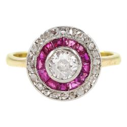 18ct gold calibre cut ruby and diamond target cluster ring, the central diamond with ruby and rose cut diamond surround, Sheffield 1982, principal diamond approx 0.25 carat