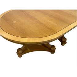 Contemporary Regency design oak and maple extending dining table - two D-ends with maple cross banding, on three curved pillar supports decorated with turned roundels, concaved triangular platform on turned bun feet, with additional leaf