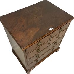 George III mahogany commode, disguised as a chest, moulded hinged top over six false drawers, on bracket feet