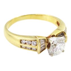 18ct gold round brilliant cut diamond ring, with channel set tapered baguette and round brilliant cut diamond shoulders, stamped, principal diamond weight approx 0.75 carat, total diamond weight approx 1.15 carat