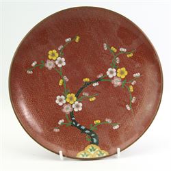 Chinese cloisonne bowl with inverted rim, decorated with geometric and floral design against a burnt orange ground, D21cm, a similar blue ground bowl, pepper pot and open salt, Japanese Inaba style cloisonne plate, decorated with an exotic bird amongst prunus, against a black ground, D15cm and another cloisonne dish (6)