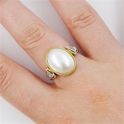 9ct gold three stone oval mabe pearl and round brilliant cut diamond ring, with Celtic design shoulders, London 1999