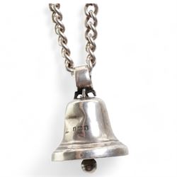 Early 20th century silver bell pendant, Birmingham 1915, on later silver chain, silver chain necklaces, silver garnet ring and a silver lapis lazuli pendant on white metal chain