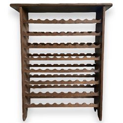 Large reclaimed oak eight tier wine rack, rectangular top over eight racks each with ten bottle divisions, on end supports