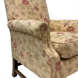 Peter Dudgeon - Georgian design mahogany framed armchair, shaped cresting rail over sprung back and seat flanked by rolled arms, upholstered in floral patterned fabric with matching seat cushion, on square supports joined by stretchers
Provenance: From the Estate of the late Dowager Lady St Oswald