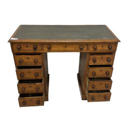 Victorian mahogany twin pedestal desk, rectangular top with inset green leather writing surface, fitted with central frieze drawer flanked by five graduating drawers on each side 