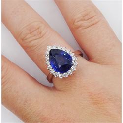 18ct white gold pear cut sapphire and round brilliant cut diamond cluster ring, hallmarked, sapphire approx 3.65 carat, total diamond weight approx 0.50 carat