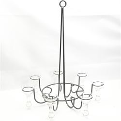 Patinated wrought metal seven-light chandelier with glass candle holders, H72cm