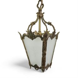 Three tier circlet electrolier hung with lustre drops and a glass and gilt metal hall lantern