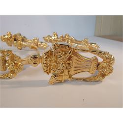Two Pairs of Gilt Curtain Tie Backs